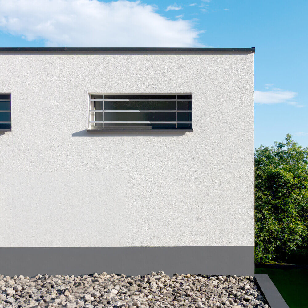 Grille de défense 1050 x 450 mm sur façade