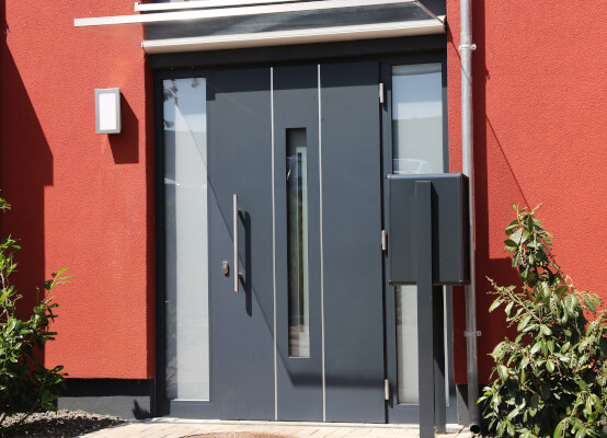 Porte entrée en verre et en aluminium